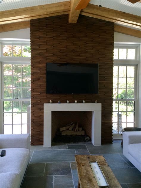 For every surviving example, of course, there are dozens that were torn from walls during reckless remodels. Ann Sacks Network wood tiles around fireplace (With images ...