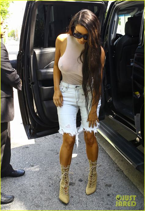 Kim Kardashian Goes Braless While Wearing A See Through Top Photo