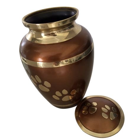 Many people choose to store their pet's ashes in an urn or scatter them at a meaningful place. Pet Paw Print Memorial Urns Ashes - Walking Paw Prints ...