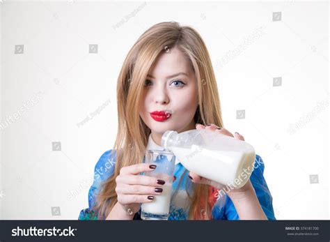 Woman Pouring Milk In Glass From Bottle Ad Paid Pouring Woman