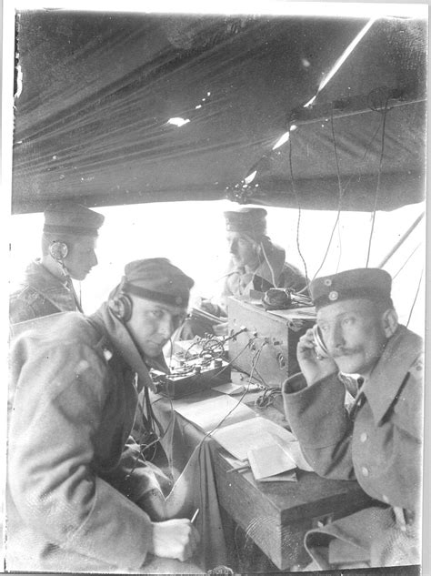 ww1 field communications german operators with earphones depend on long wire lines laid by