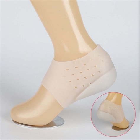 Hot Unisex Invisible Height Increase Socks Heel Pads Silicone Insoles Foot Massage Silicone Heel