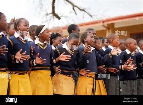 Students At A Township School In South Africa Sing During Assembly