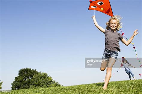 Girls Playing With Kites Outdoors Photo Getty Images