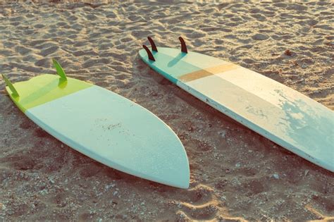 Premium Photo Surfboards On The Beach