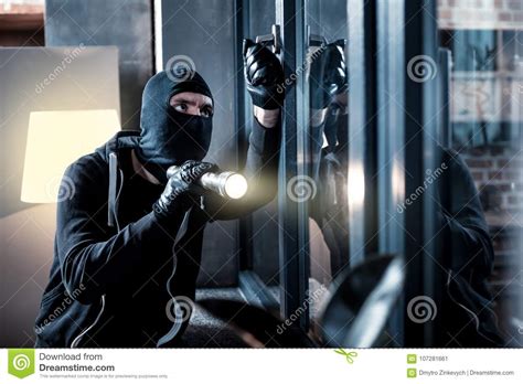 Masked Burglar Breaking Into The House Stock Image Image Of Dangerous Gangster 107281661