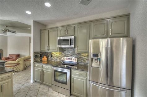 Neu appliances is an appliance outlet. Austin's Paint Guys | Bay house, Kitchen cabinets, Kitchen ...