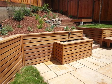 Pressure Treated Retaining Wall With Horizontal Redwood Facing