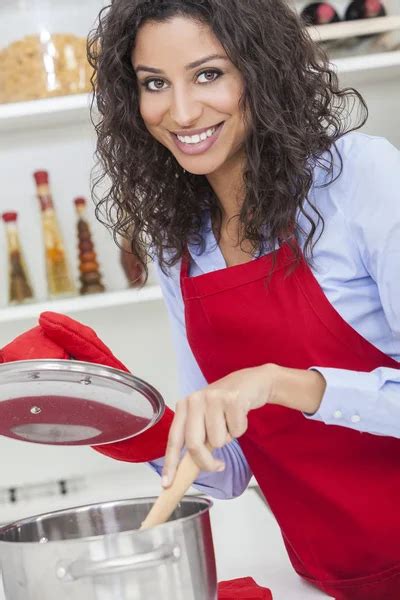 Happy Woman Cooking In Kitchen Stock Image Everypixel