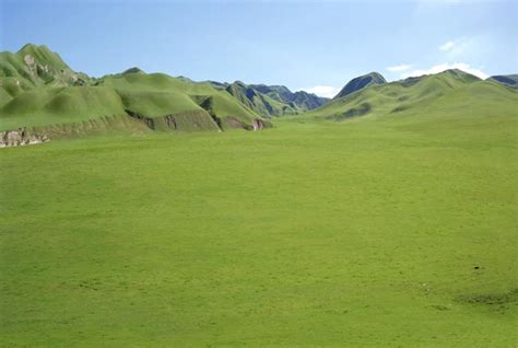 The Great Grass Plains An Area Of Green Grass And Rolling Hills Were