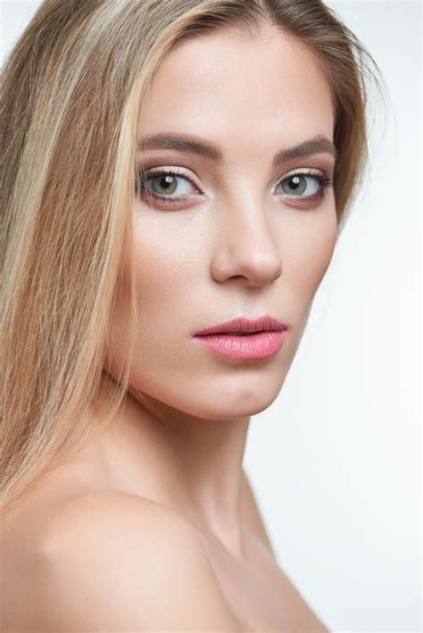 Half Profile Portrait Of A Blonde Green Eyed Model With Makeup On