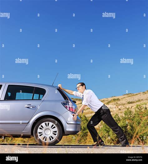 Pushing Car Hi Res Stock Photography And Images Alamy