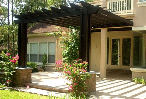 Modern pergola design materials including wood, vinyl, fiberglass, aluminum and chlorinated polyvinyl chloride (cpvc) rather than brick or stone Dark-attached-pergola | Building a pergola, Pergola ...