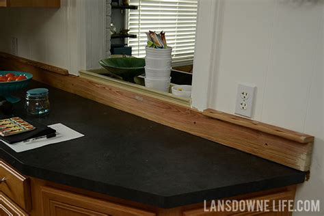 Maybe you would like to learn more about one of these? Painted wood molding kitchen backsplash - Lansdowne Life
