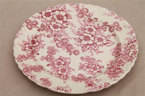 Taylor smith taylor 5532 bread plate, 6 3/8 diameter, green rim and floral pattern that i think is pink dogwood, but could not find a match in my research. vintage raspberry red chintz floral Taylor Smith Taylor ...