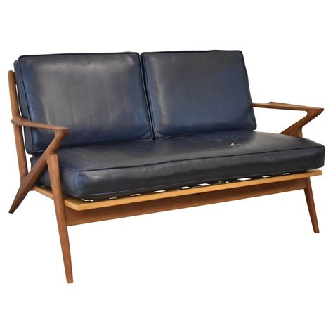 We pride ourselves on being the largest vintage danish modern furniture retailer in the state of florida. Danish Mid-Century Modern Teak Two Cushion Z Sofa by Poul ...