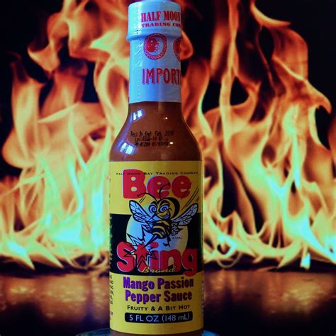 Bee Sting Mango Passion Pepper Sauce The Flaming Hoop Chilies