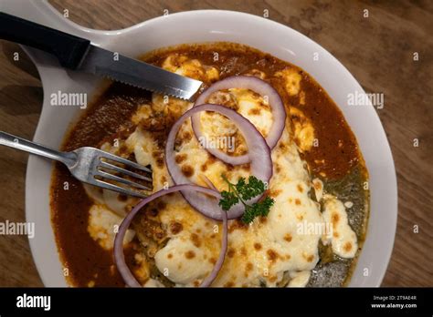 Indulge in the rich tapestry of Mexican cuisine with chilaquiles, a