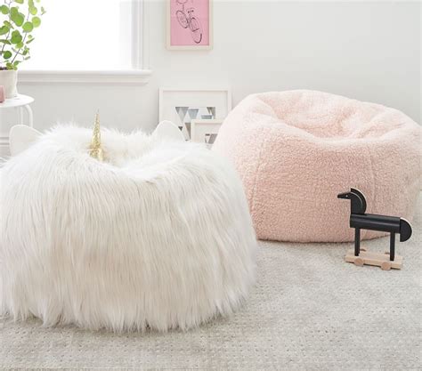 They are so comfortable that in the intervening fifty years, bean bag chairs have evolved from the squishy vinyl balls stuffed with styrofoam beads into shaped chairs, couches, computer rockers and more. Ivory Unicorn Faux Fur Anywhere Beanbag™ | Kids Bean Bag ...