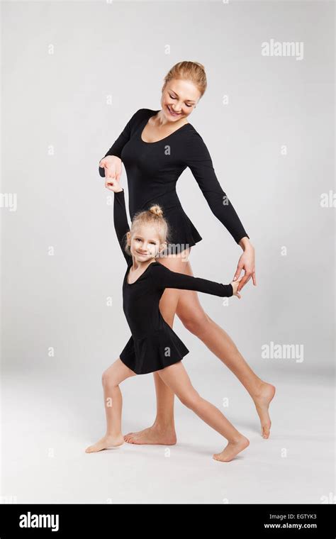 Mom Teaching Daughter Dancing Daughter And Mother Are Gymnastics Stock