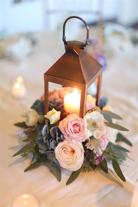Lanterns And Flowers Is Part Of Lantern Centerpiece Wedding Weddings