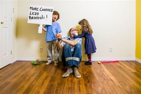 Funny family in weird raincoat. 'Is My Family Crazy?' Funny Thoughts About Families