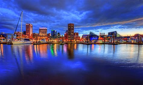 The food of inner harbor reflects the atmosphere of the district itself. Baltimore Inner Harbor Sunrise Photograph by Craig Fildes