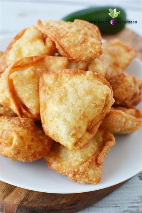 Do not over stuff, cream cheese will overflow. Fried Wonton Jalapeno Poppers with Pepperjack Cheese