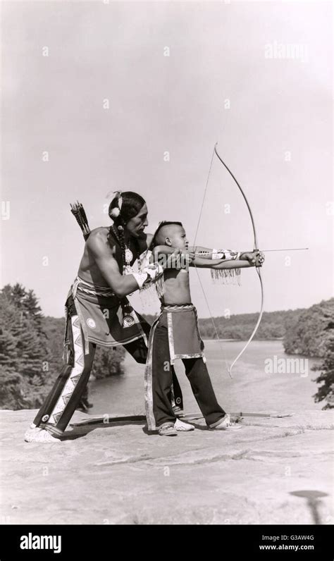 Native American Shooting Bow And Arrow