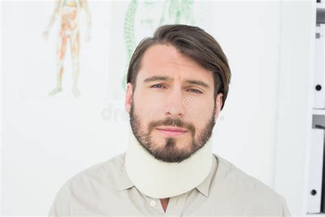Portrait Of A Young Man Suffering From Neck Pain Stock Photo Image Of