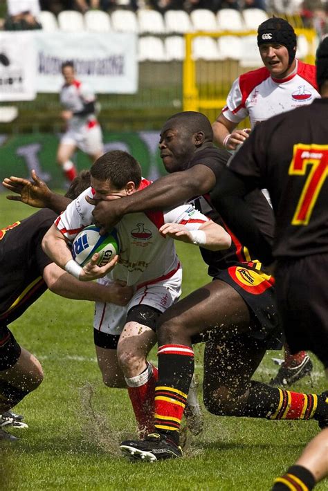 Poland Belgium Rugby 2 Boys Play Football Man Play Rugby Flickr