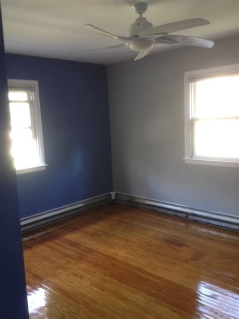 Blue Bedroom Grey Accent Wall And Polyurethane Hardwood
