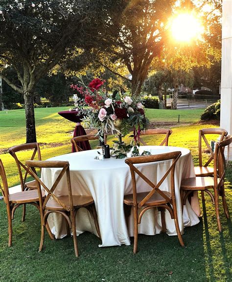 Cross back dining chairs farmhouse chairs wood chair chair wooden chair crossback chairs cool chairs decor vintage chairs. Sunset Wedding with crossback chairs