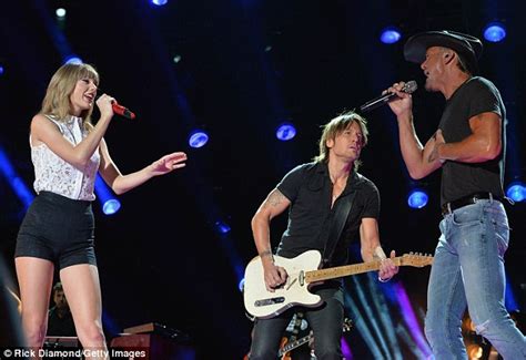Taylor Swift Dons Tiny Hotpants As She Rocks Out Onstage With Keith