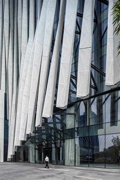 Architect Designs Buildings With Fluid Aluminum Facades Light Metal