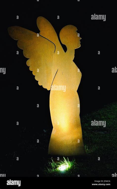 The Illuminated Angel Stock Photo Alamy