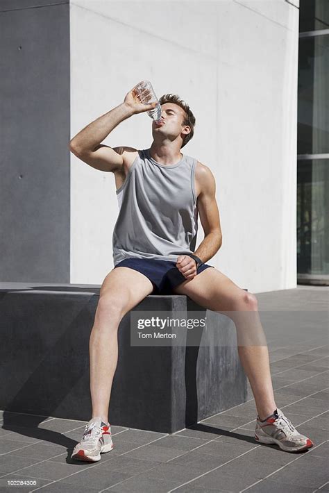 Man Drinking Water After Exercise High Res Stock Photo Getty Images