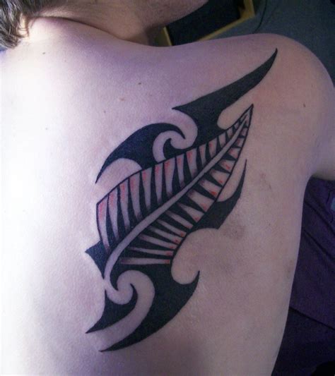 Maori Tribal Design And Silver Fern Tattoo