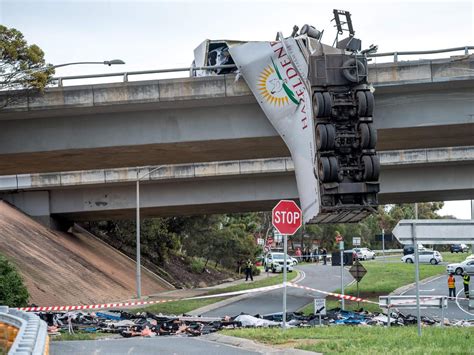 Melbourne Traffic Truck Crash Calder Freeway Hanging Off Bridge