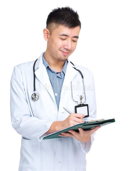 Medical Doctor Looking At Clipboard Stock Image Image Of Portrait