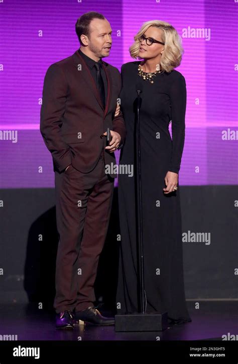 Donnie Wahlberg Left And Jenny Mccarthy Present The Award For