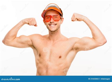 Young Man Flexing Muscles With Barbell In Gym Royalty Free Stock Image
