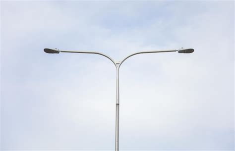 Premium Photo Street Lighting Lamps Illuminate Urban Road At Dusk
