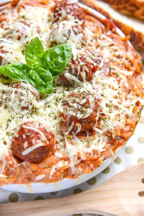 In a large skillet, brown meatballs over medium heat until a thermometer reads 160°; Baked Spaghetti and Meatballs - Courtney's Sweets