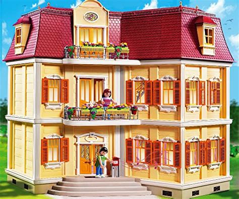 Maman avec son bébé vêtue d'une jolie grenouillère. Playmobil 5302 - La grande casa
