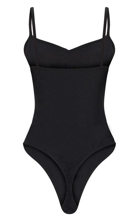 Black Strappy Popper Bodysuit Tops Prettylittlething Ie