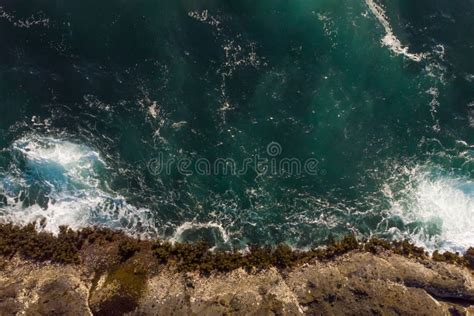 Aerial Top View Of Ocean Waves And Fantastic Rocky Coast Wallpaper