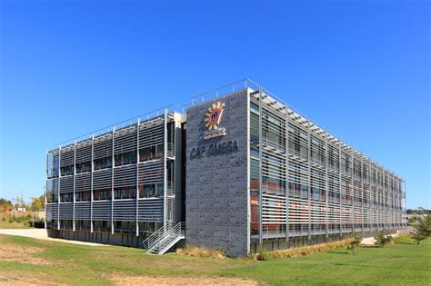 Cap omega incubateur d'entreprises à montpellier. Cap Omega - façade nord - Parc Eurêka - Photo : JL Girod ...