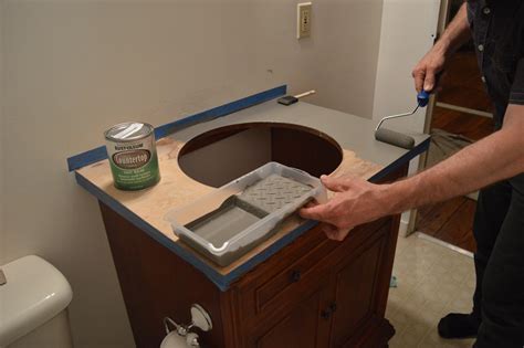 Painting a bathroom vanity is an easy way to update your bathroom without spending a lot of money. Rental Refresh: Big Bangs in Small Projects :: New Faucets