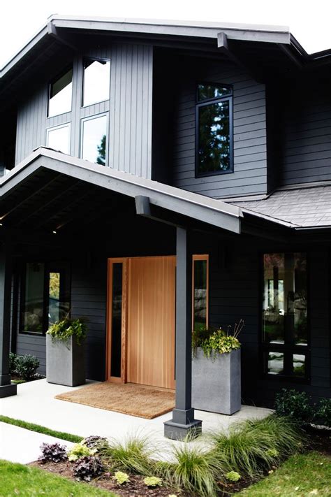 The exterior siding add visual contrast that's caught on by the pink shutters which also add a touch of whimsy and. Sleekness in Seattle: Modern Garden, Midcentury House ...